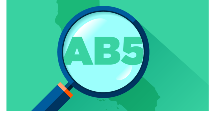 An illustrated magnifying glass is hovering over the words AB5